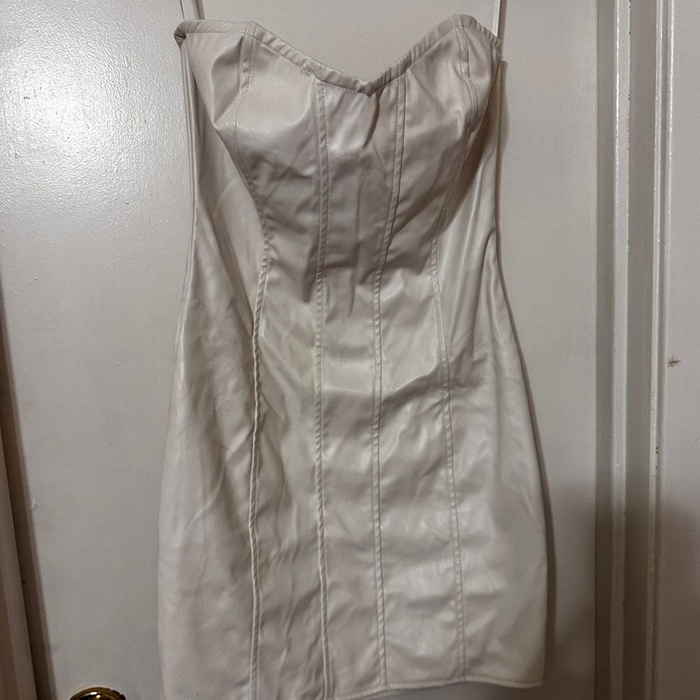 Blue Bkush white pleather dress. With light boning